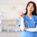 A friendly medical professional in blue scrubs ensuring cosmetic surgery in Vietnam safe
