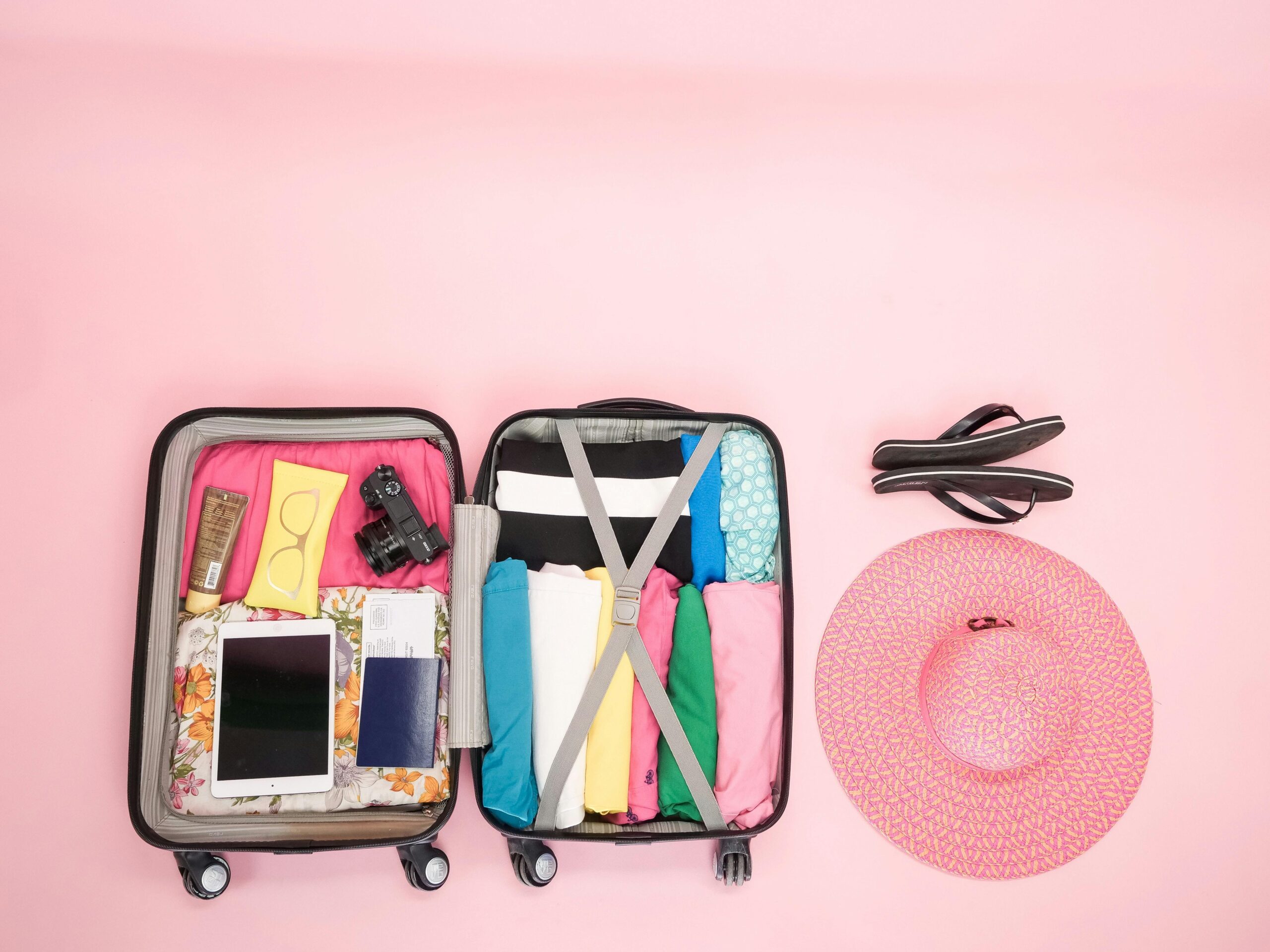 Open suitcase neatly with clothes and travel essentials. pack for surgery abroad